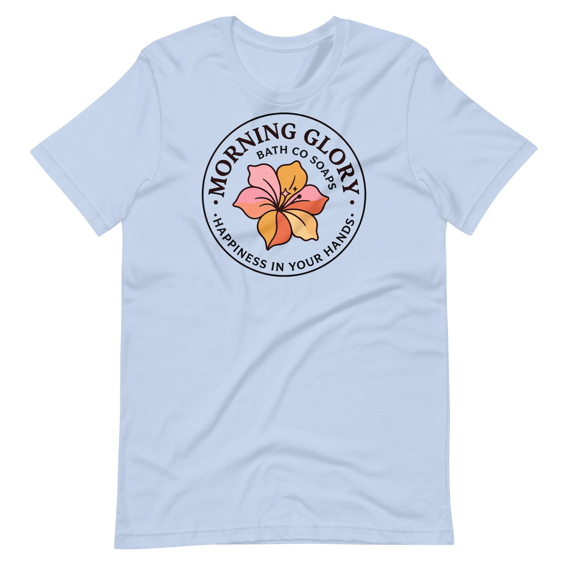 A baby blue Morning Glory Bath Co t-shirt featuring the circular 'Happiness in Your Hands' floral logo against a plain white background